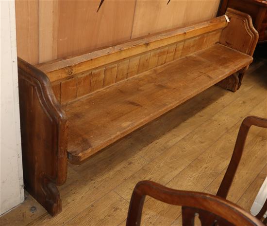 A Victorian pine pew L.226cm